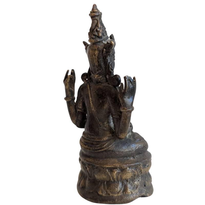 Rear-right view showing the four arms, crown and lotus pedestal