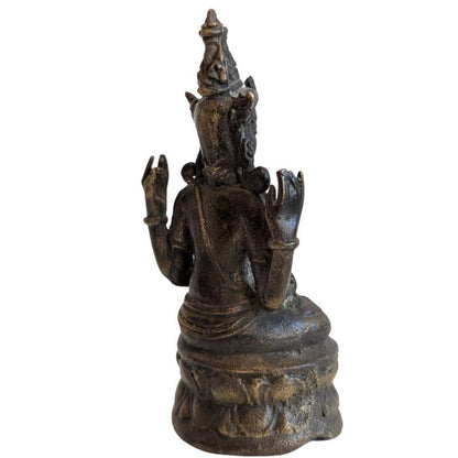 Rear-right view showing the four arms, crown and lotus pedestal