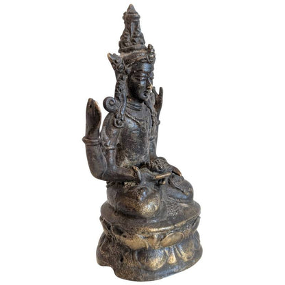 Right-front view of the crowned Avalokiteshvara with raised ritual hand gestures