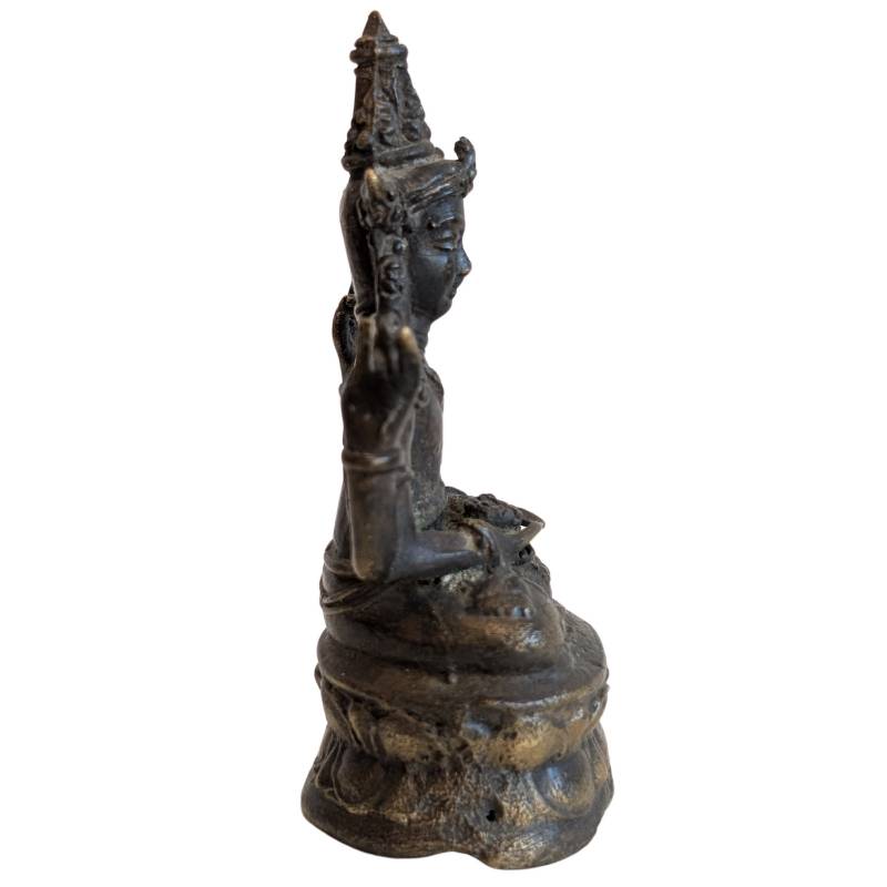 Right profile of the small four-armed bronze Avalokiteshvara