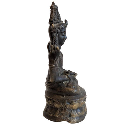 Right profile of the small four-armed bronze Avalokiteshvara