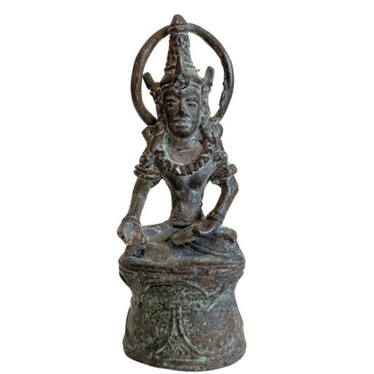 Front view of the Thai Khmer-style crowned Buddha seated beneath a circular halo