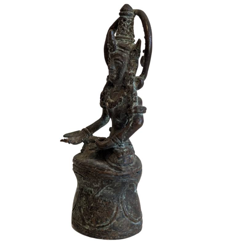Left profile of the meditating crowned Buddha and circular halo