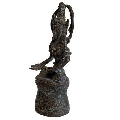 Left profile of the meditating crowned Buddha and circular halo