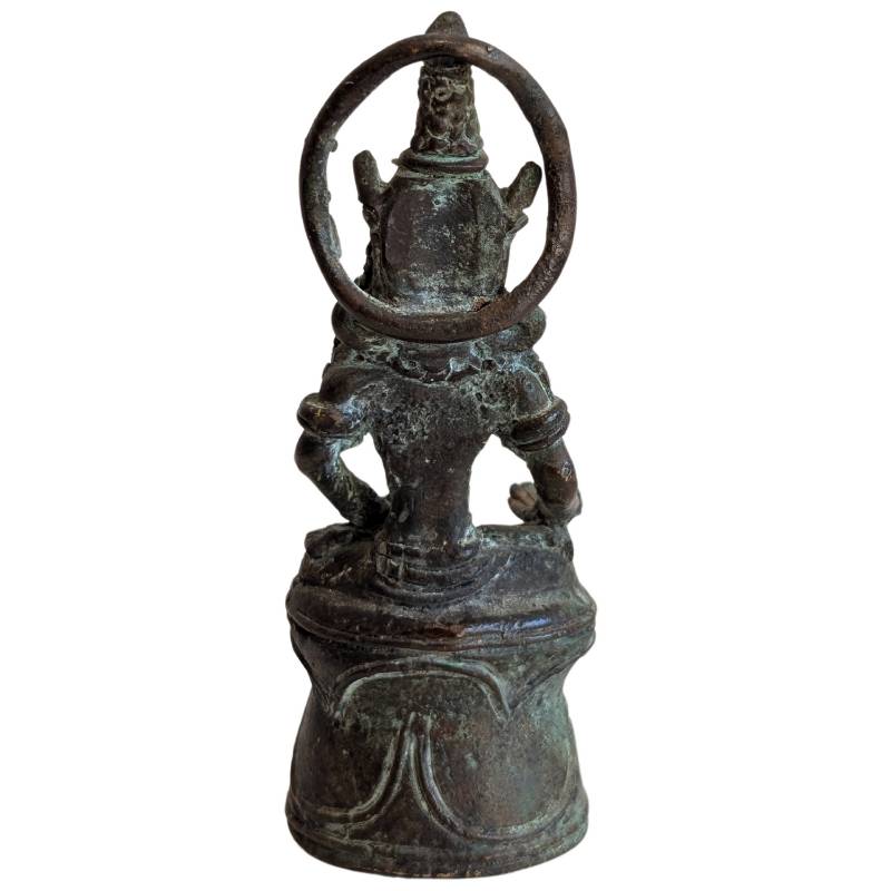 Rear view showing the circular halo, crown and bell-shaped pedestal