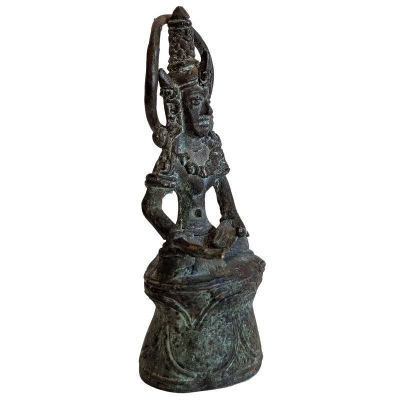 Right-front view of the meditating bronze Buddha on a bell-shaped base