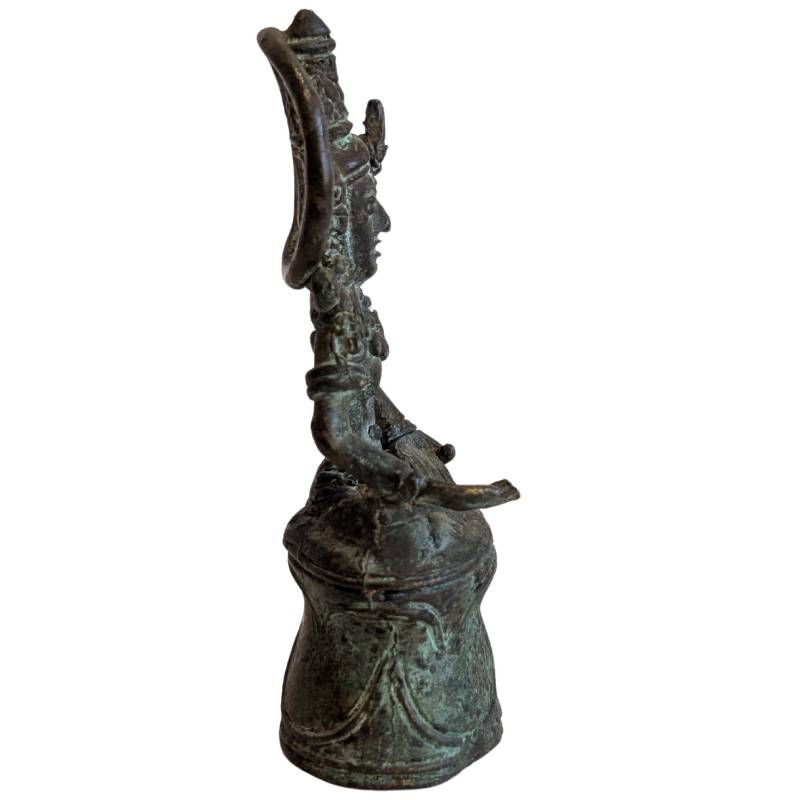 Right profile of the crowned Buddha with circular halo and raised base