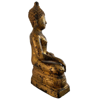 Right profile of the seated Rattanakosin bronze Buddha with surviving gilding