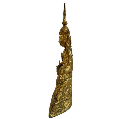 Opposite side view showing the slender profile and tall flame finial