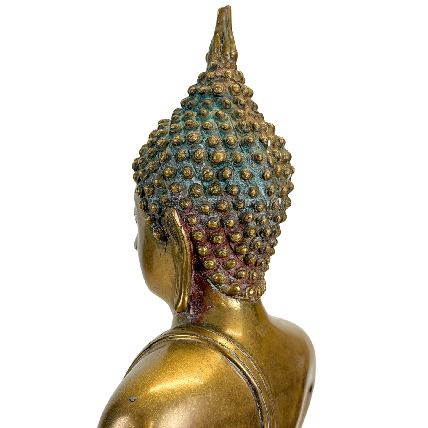 Rear three-quarter detail of the head and hair curls of the Thai Shakyamuni Buddha
