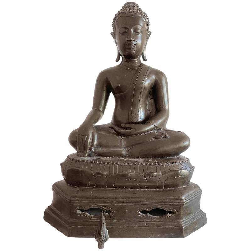 Front view of the seated bronze Buddha with the removable flame finial placed below the base