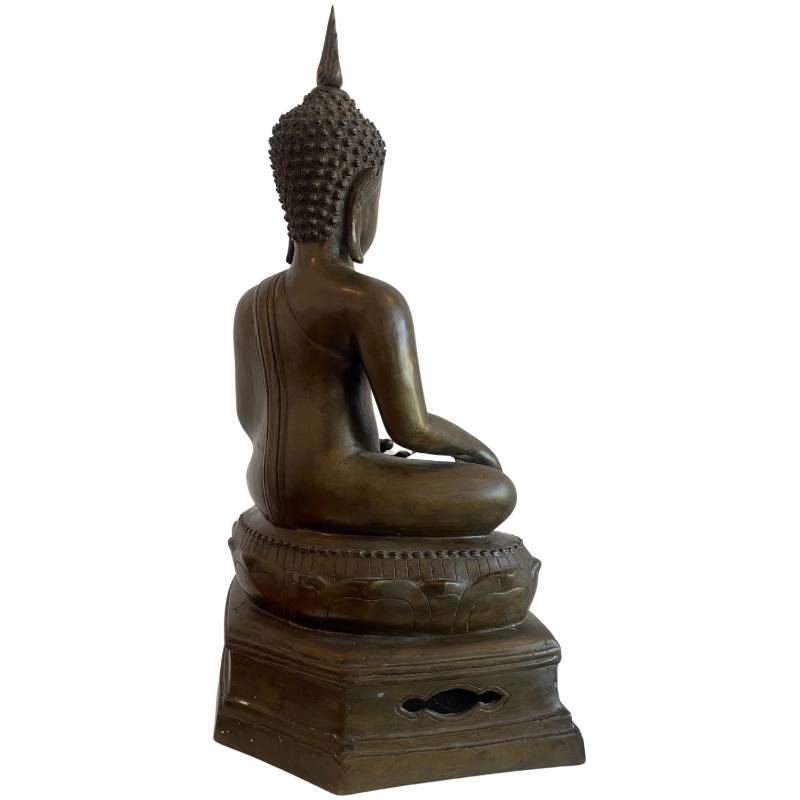 Rear-right view of the Thai bronze Buddha showing the robe and lotus pedestal