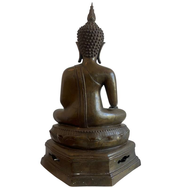 Rear view of the seated Thai bronze Buddha with flame ushnisha and pierced pedestal