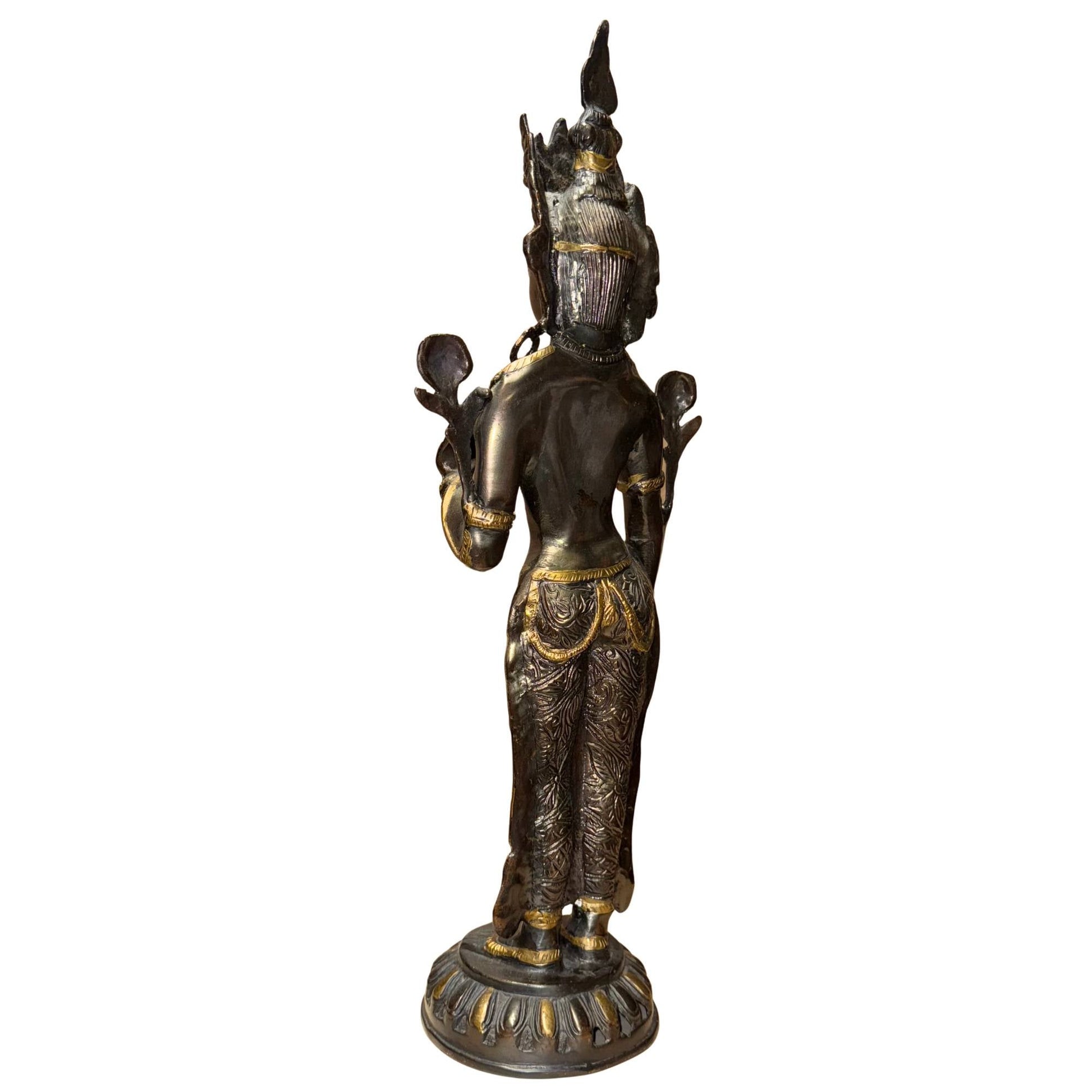 Tibetaanse bronzen Tara met donkere patina en oude goudaccenten in de details