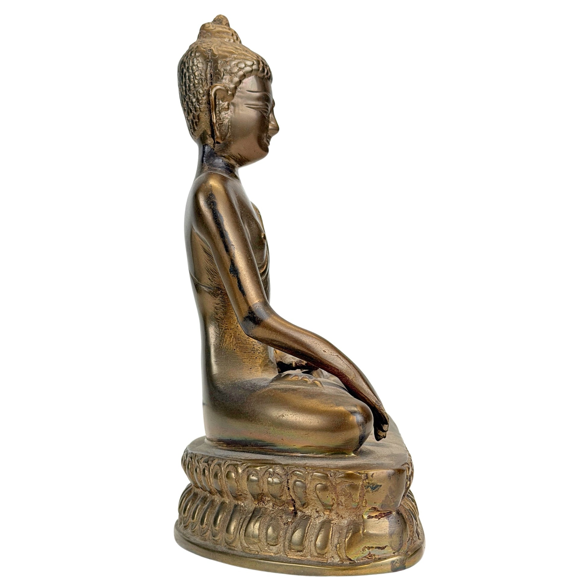 Layered historic patina on the antique Tibetan bronze Buddha