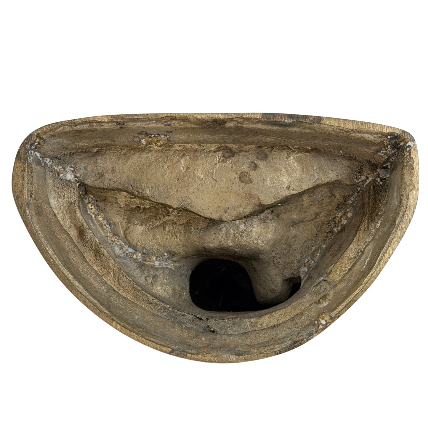 Underside of the Tibetan Buddha showing traditional hollow bronze casting