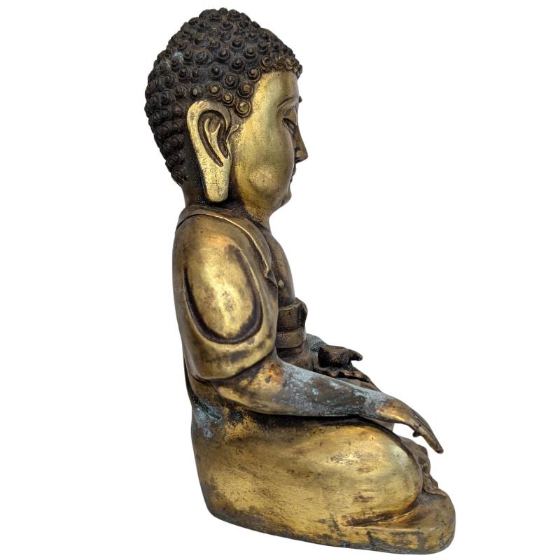 Underside of the Tibetan gilt bronze Shakyamuni Buddha
