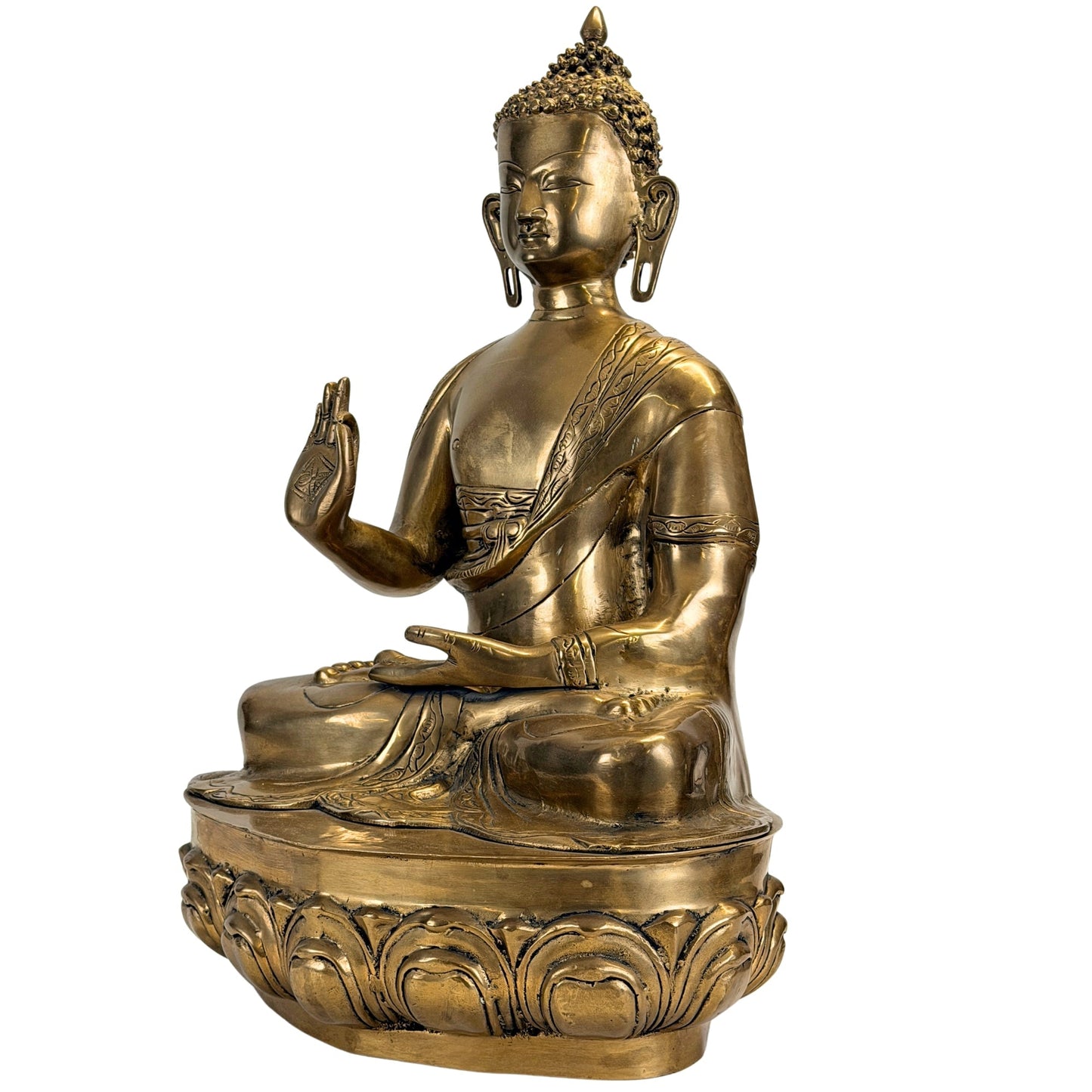 Front left three-quarter view of the antique Tibetan-Himalayan Shakyamuni Buddha