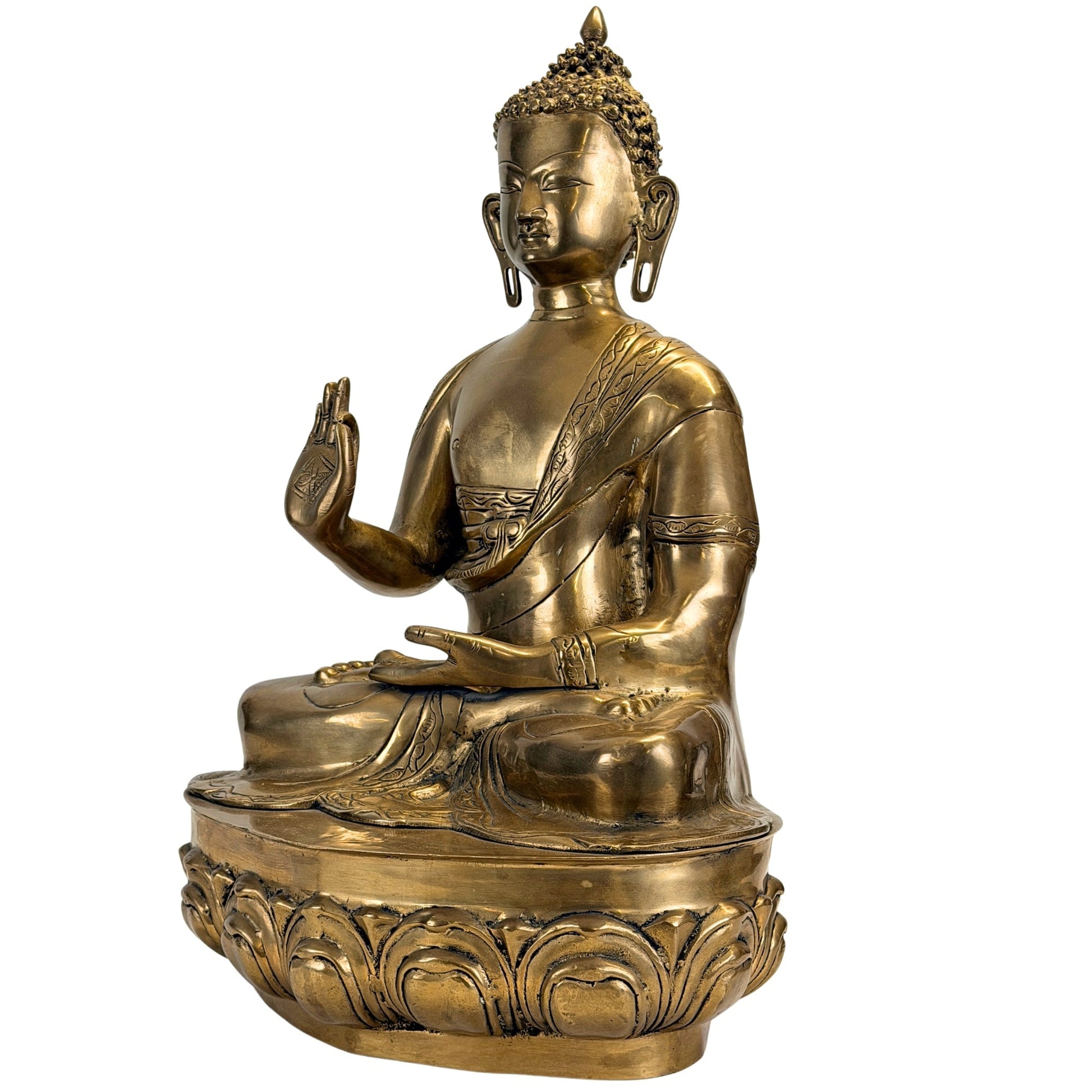 Front left three-quarter view of the antique Tibetan-Himalayan Shakyamuni Buddha