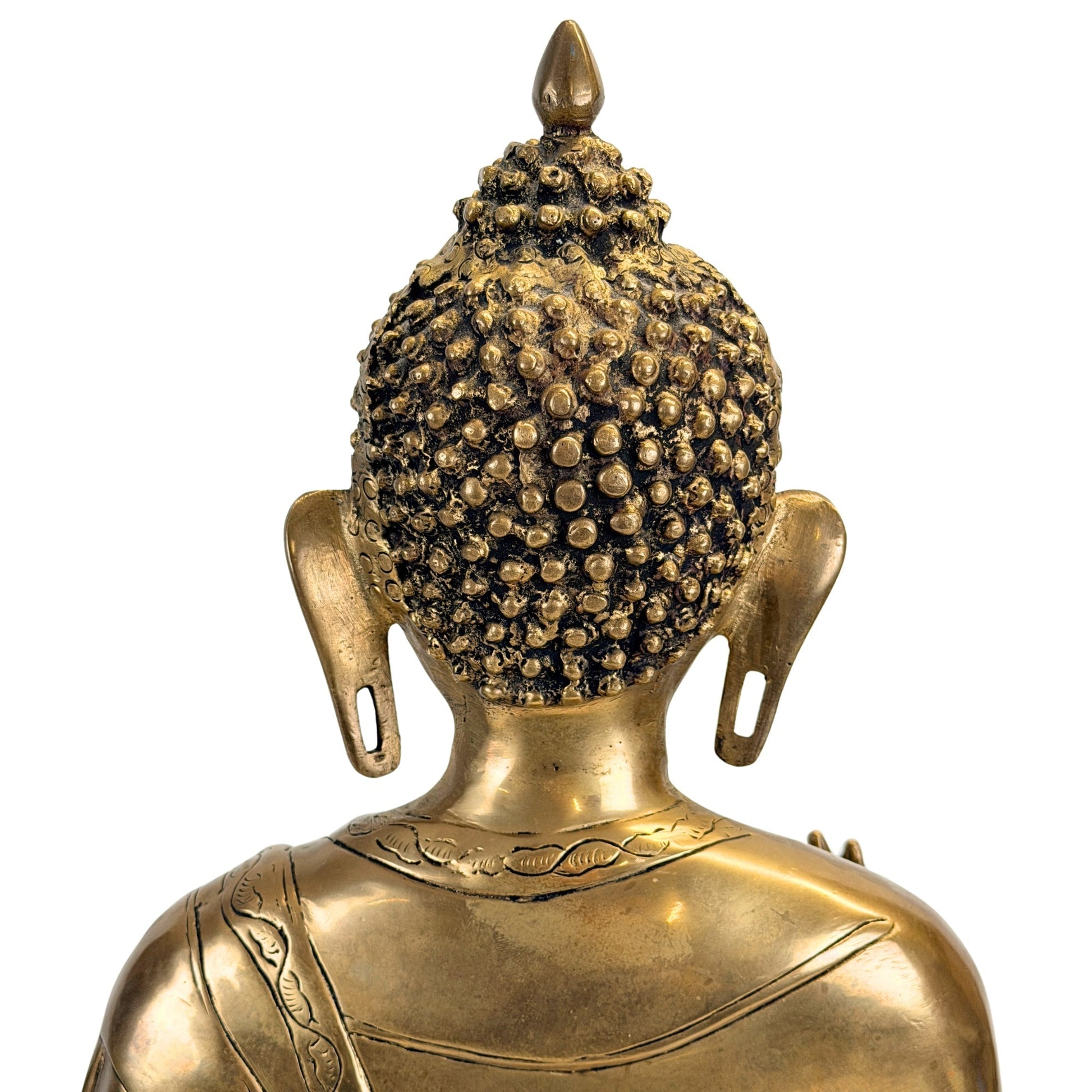 Rear view of the Buddha's head showing the patterned hair curls