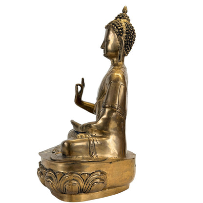 Left side view of the large antique Tibetan Shakyamuni Buddha in bronze