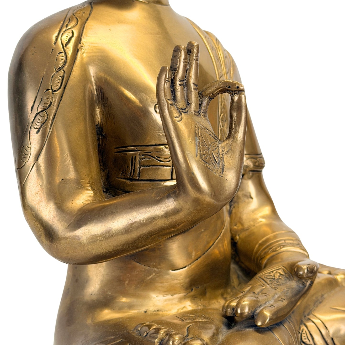 Raised right hand of the antique Tibetan Shakyamuni Buddha, detail view