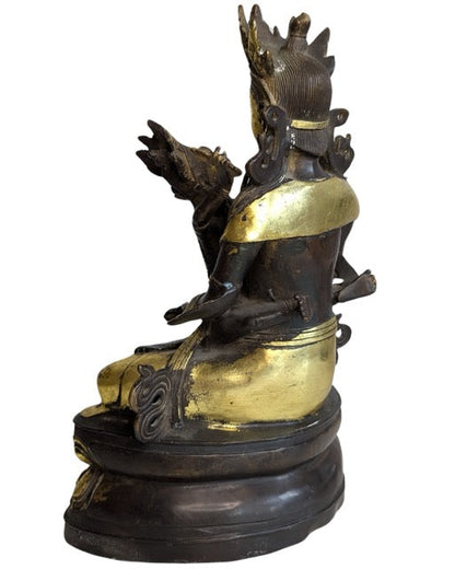 Tantric Buddhist Yab-Yum figure seated on a lotus base