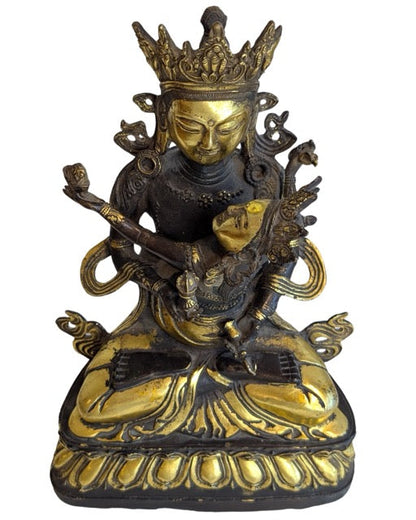 Lotus base and aged surface of the Yab-Yum bronze