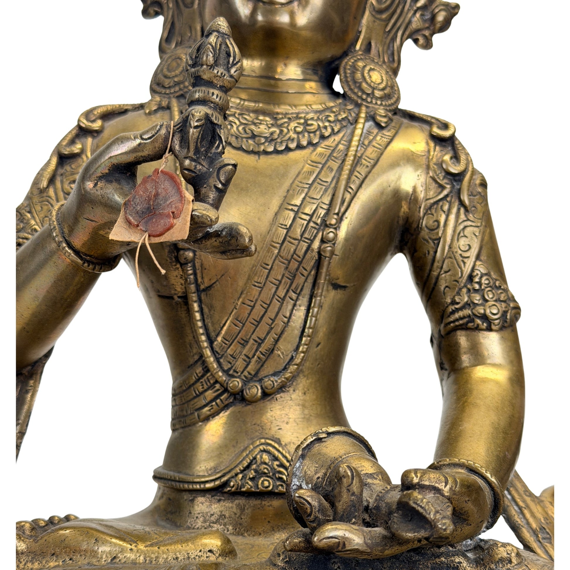Historic fire-gilded surface on the antique Tibetan Vajrasattva