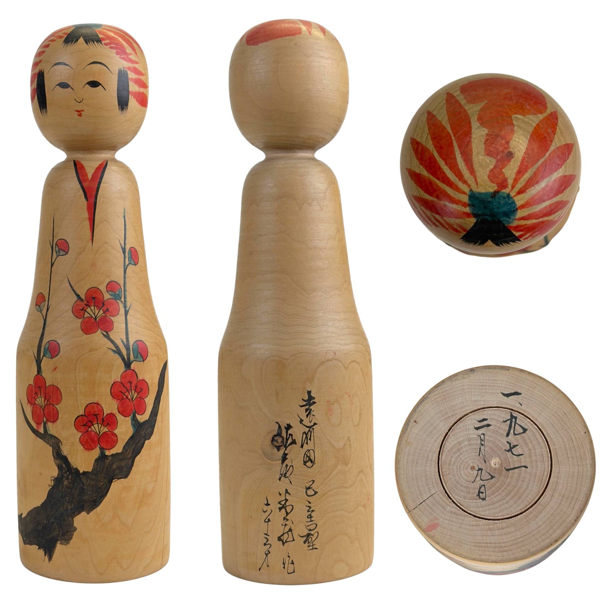 Togatta Kokeshi van Yoshio Ogasawara met pruimenbloesemmotief