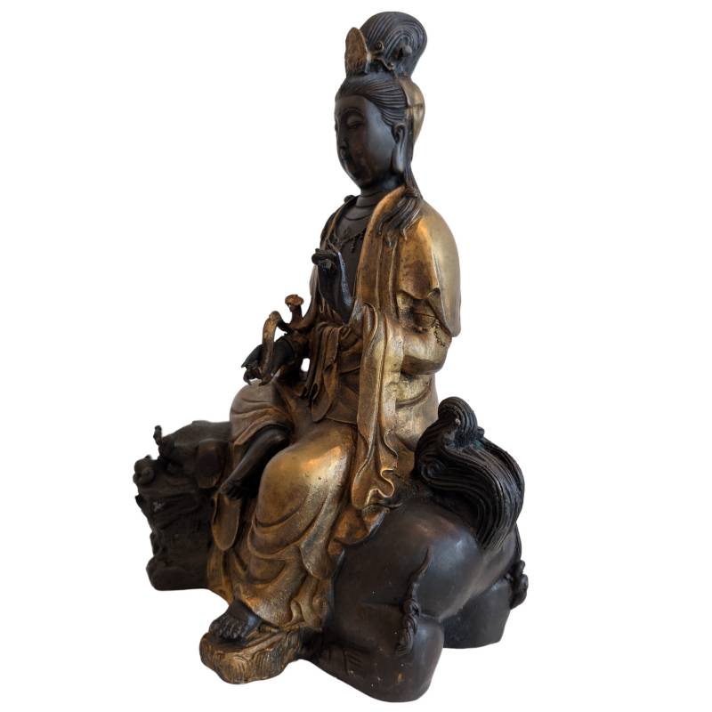 Left-front view of the vintage Chinese Guanyin and guardian lion composition