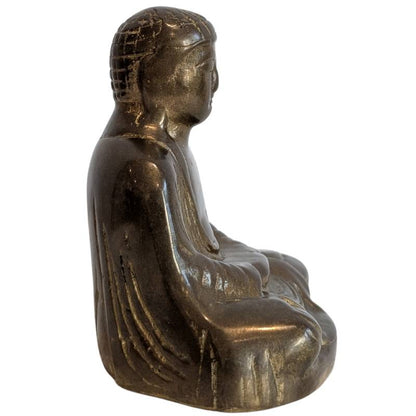 Hands of the bronze Buddha resting in Dhyana Mudra