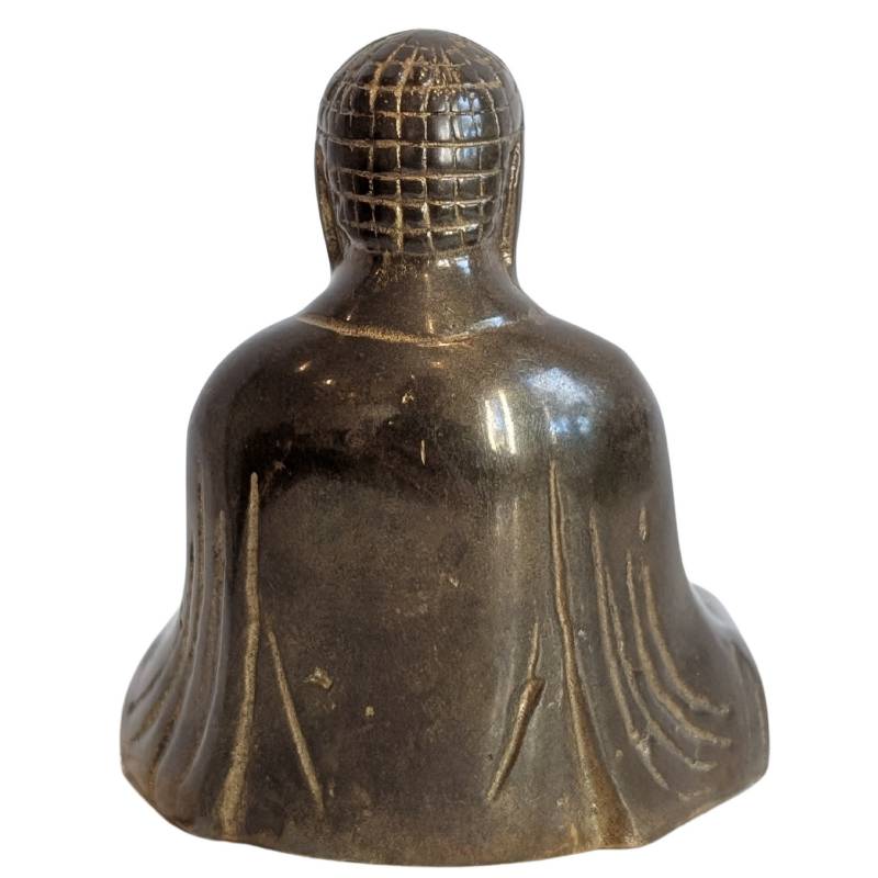 Vintage bronze Buddha with a naturally aged surface