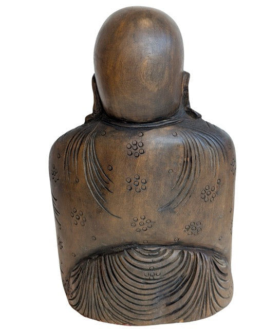 Warm smooth finish on the hand-carved wooden Budai