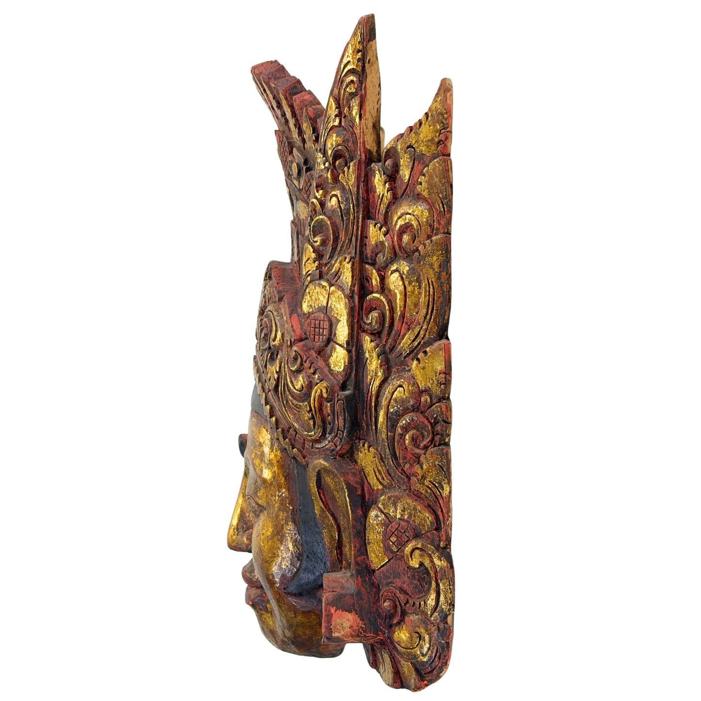 Linker zijaanzicht van het vintage Indonesische tempelmasker uit Bali, met duidelijke weergave van de dikte en de organische structuur van het Pule-hout.