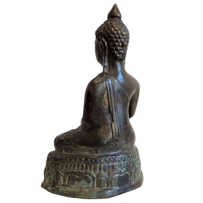 Rear-left view of the compact bronze Buddha with dark natural patina