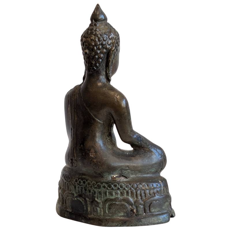 Rear-right view showing the Buddha's robe and aged bronze surface