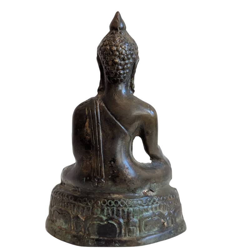 Rear view of the Thai bronze Buddha and decorated pedestal