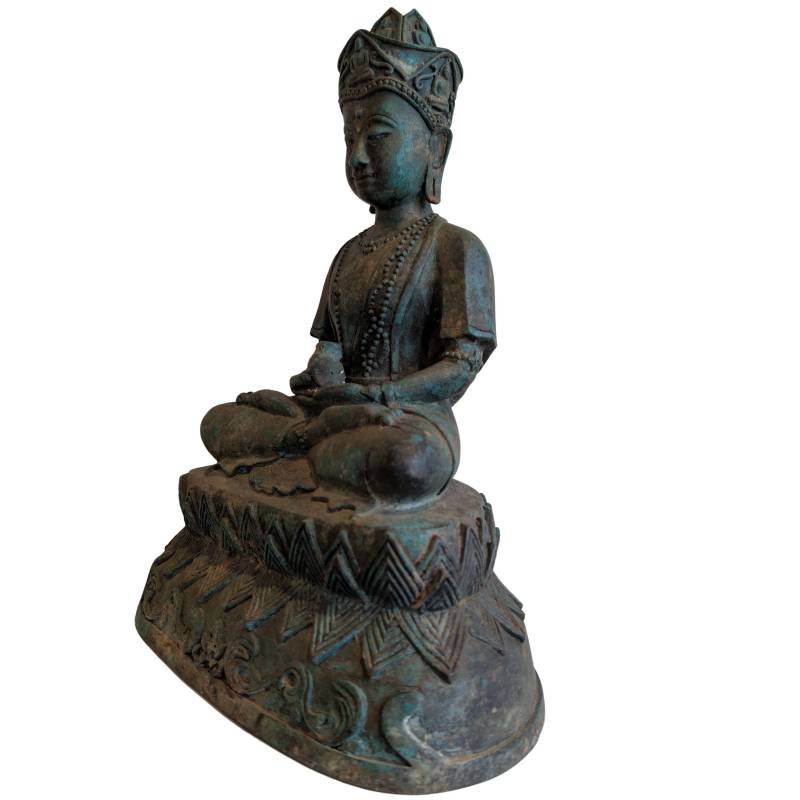 Left-front view of the seated Thai crowned Buddha with vessel in the lap