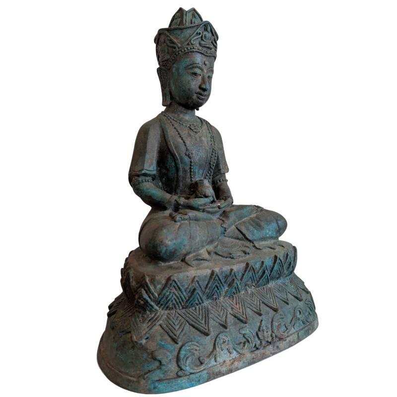 Right-front view of the crowned Thai bronze Buddha holding a small vessel in the lap
